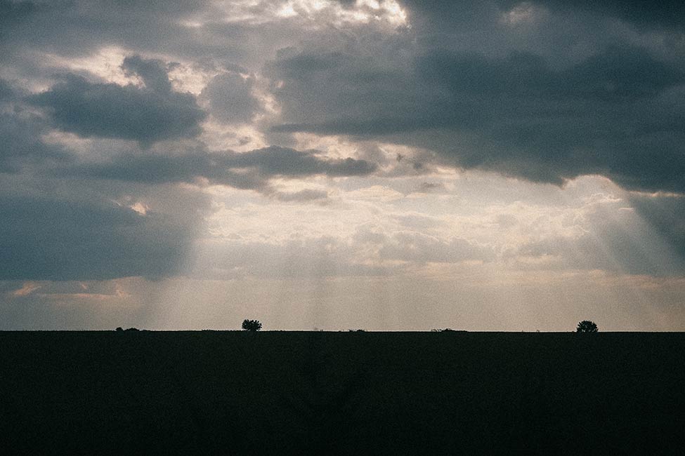 Moody clouds on a engagement photography adventure