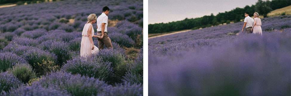 An engaged couple walking through lavender in Moldova.