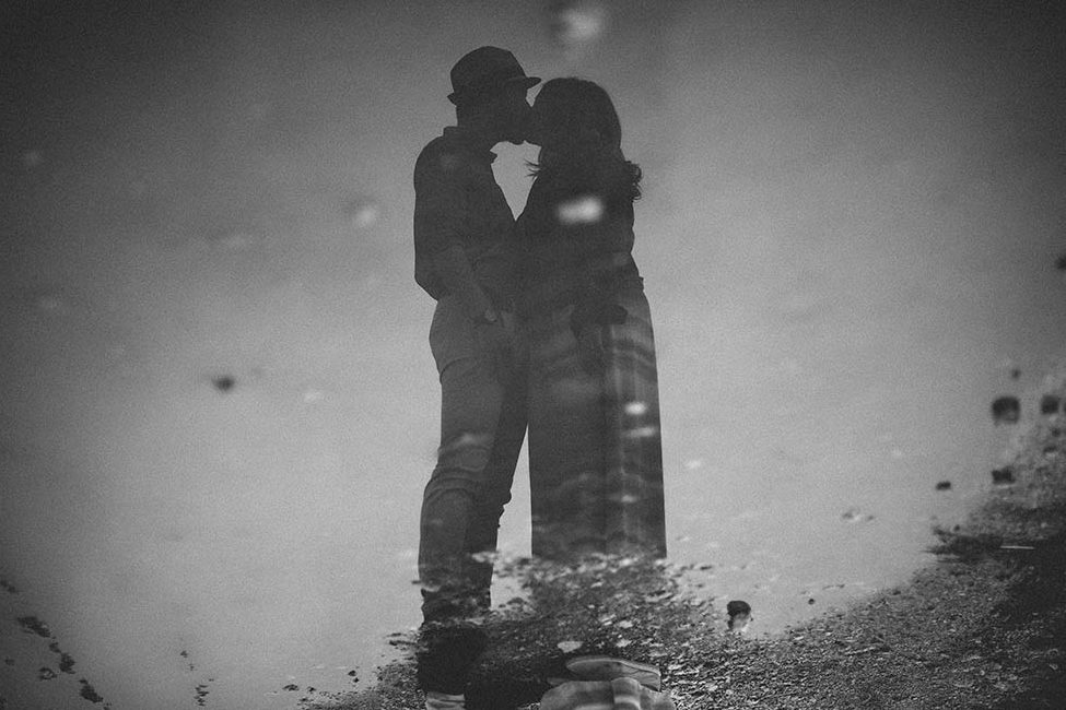 Reflection of a couple in love and getting married in verona, italy.