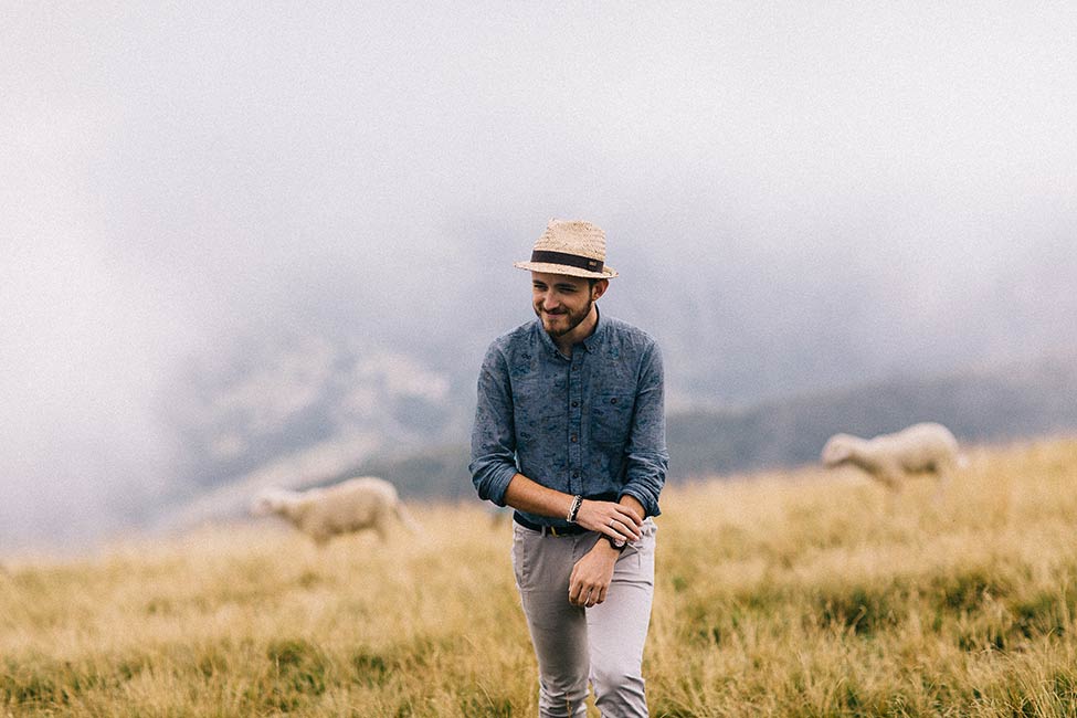 Enrico, Italy wedding photographer of Enrico & Eleonora, adventures with sheep atop an monte baldo on an adventure session.