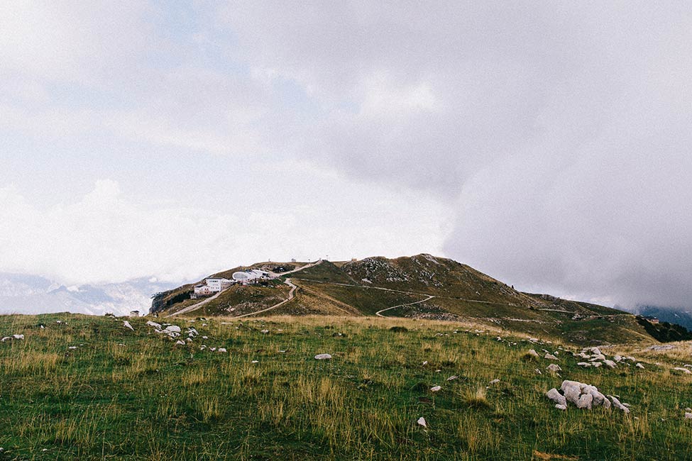 The green hills of Italy's lake district make amazing backdrops for wedding photographers.