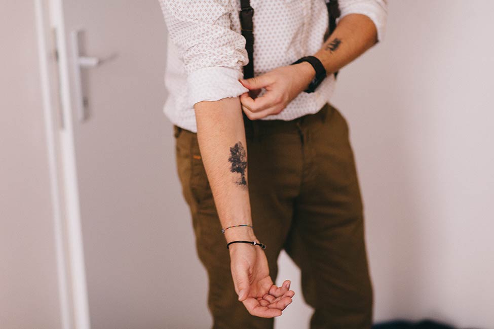 Tattoos are a must in an indie, bohemian wedding. Matching tattoos between bride and groom are even better.