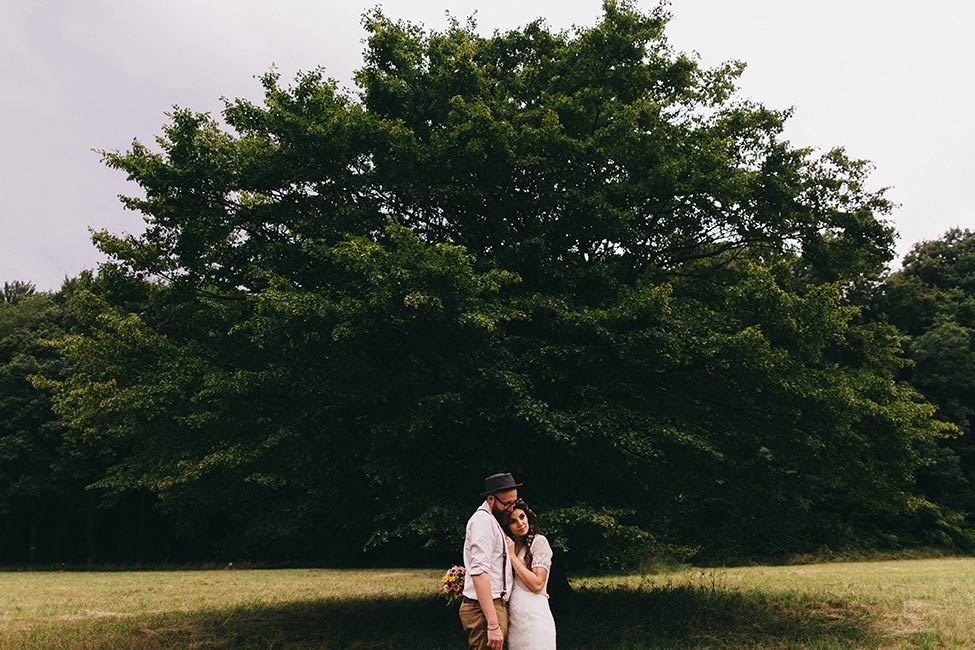 A tree symbolizes the growth of a new family during this adventurous destination wedding.